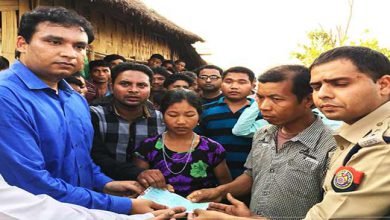 Assam: DC hands over cheque as ex-gratia to family members of raped and murdered victim