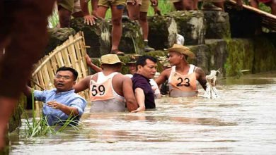 Manipur: IAS officer helping marooned people in waist-deep water