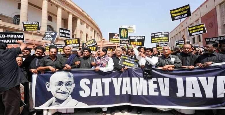 Opposition MPs protest over Rahul Gandhi’s disqualification and Gautam Adani issue