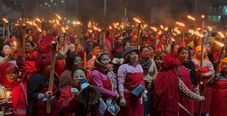 Manipur Women take out torch rally, stage Dharna demanding withdrawal of SoO, Assam Rifles