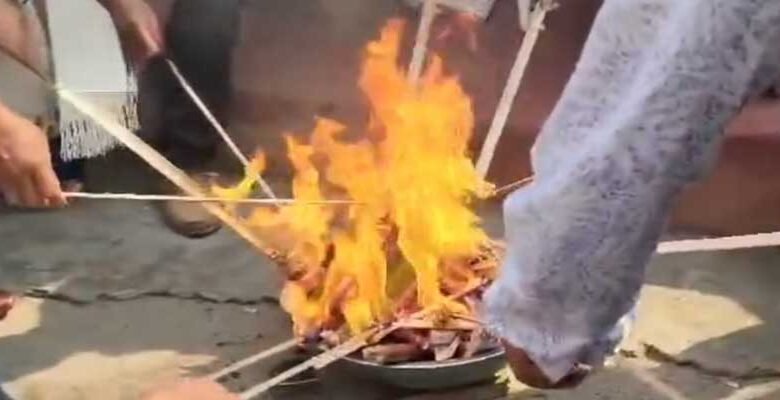 Mizoram: Pig farmers protest by burning imported frozen pork in Aizawl